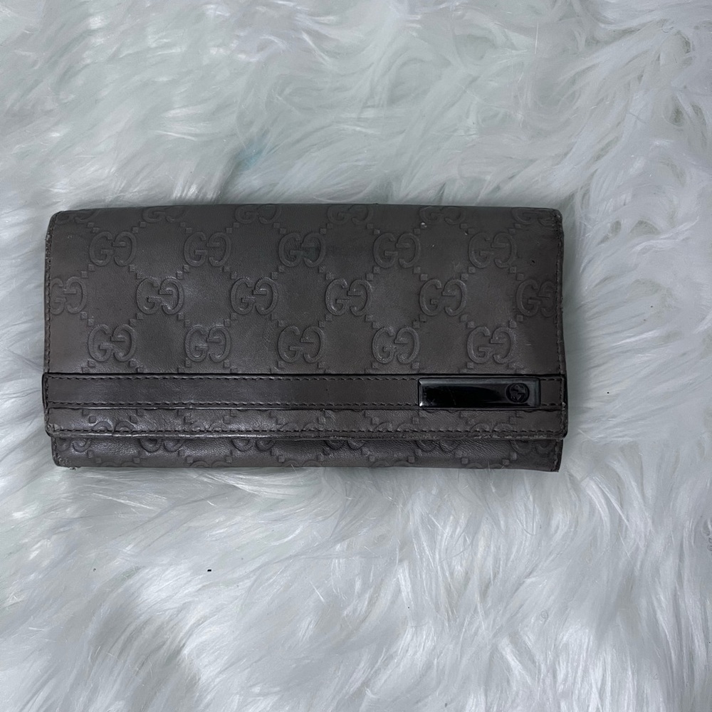 Gucci Guccissima Leather Wallet.